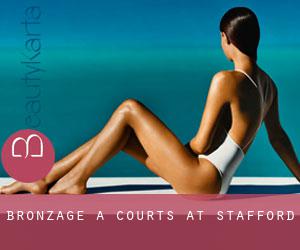 Bronzage à Courts at Stafford